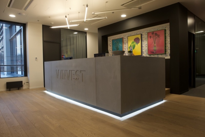 Two reception desks from a sprayed fibreglass concrete of a 20 mm thickness. Inner structure is made of a metal stud frame.
