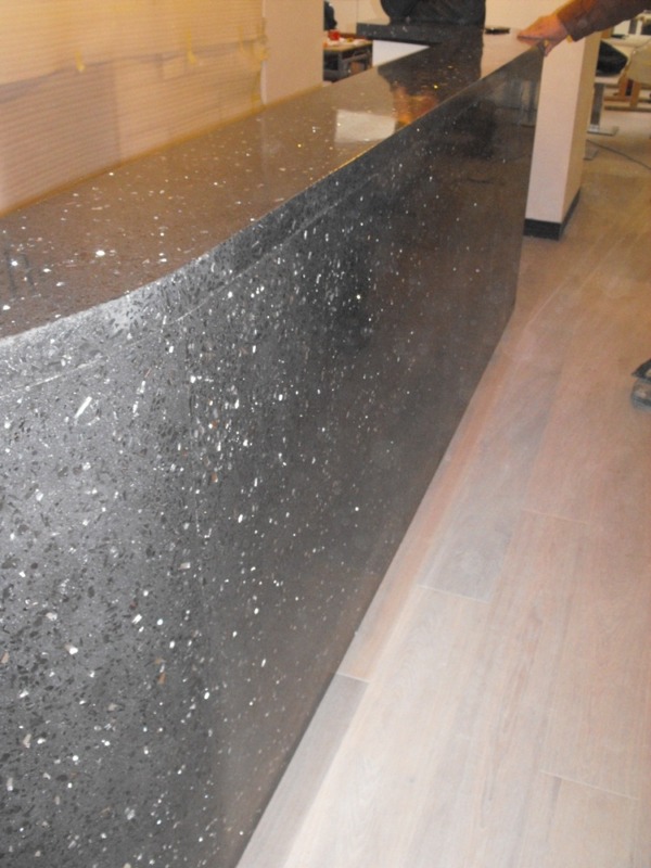 Reception in the Pure White hotel was made from a crushed concrete, filled by a mirror crushed material of 40%.