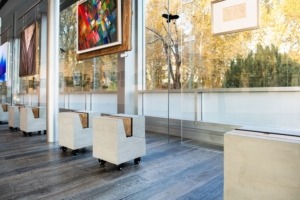 Concrete base and glass. Concrete stands for paintings