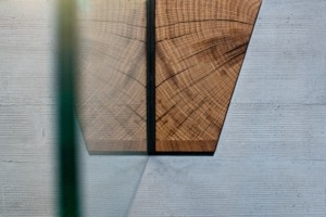 Concrete base and glass. Concrete stands for paintings